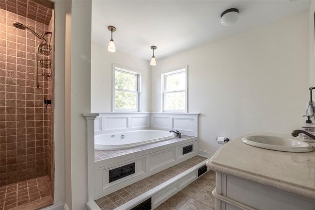Bathroom with vanity, plus walk in shower, and tile patterned floors | Image 23