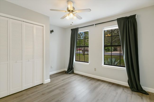 The main level hosts two secondary bedrooms. | Image 12