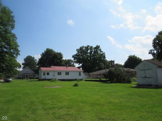 view of green lawn with a shed | Image 16