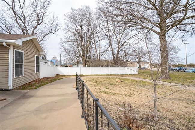 View of yard featuring a patio and fence | Image 32