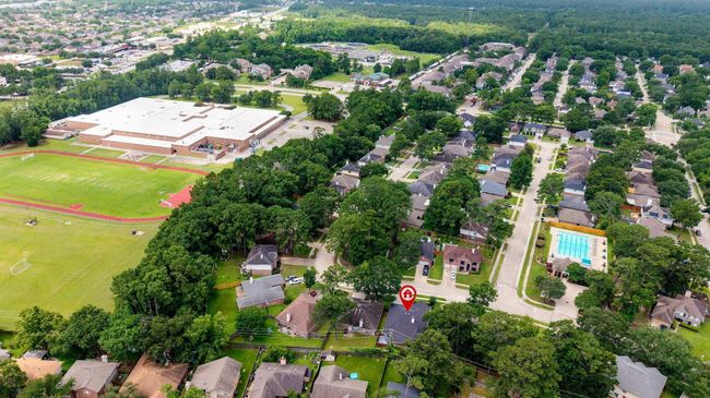 Views from the sky reveal the full landscape of greenery, community, schools, and parks. | Image 39