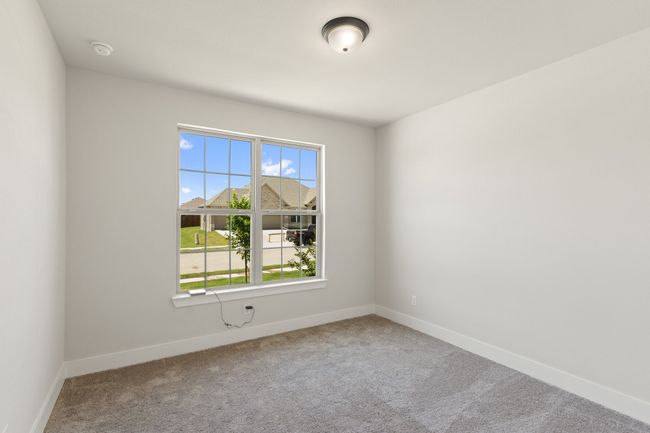 Carpeted spare room with baseboards and a smoke detector | Image 21