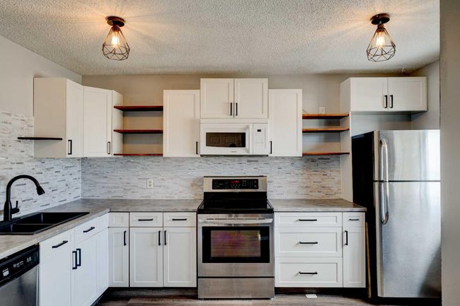 7812 Cedarwood Park, Home with 3 bedrooms, 1 bathrooms and 2 parking in Grande Prairie AB | Image 3