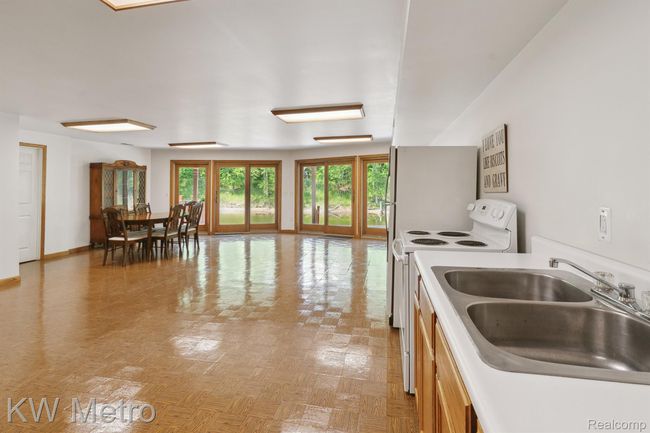 Lower Level w/Double Door Walls to Brick Paver Patio | Image 24
