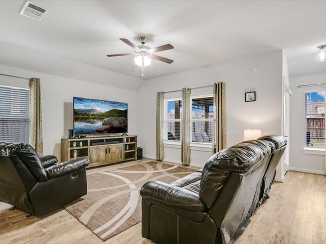 This is not a virtual picture! Note the gambrel ceilings, well maintained flooring, mini blinds and the space for larger furniture! | Image 8