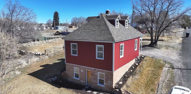View of side of property with roof with shingles | Image 36