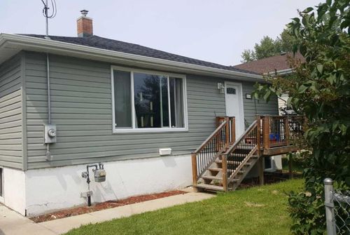 5556 44 Avenue, Home with 4 bedrooms, 2 bathrooms and 1 parking in Red Deer AB | Card Image