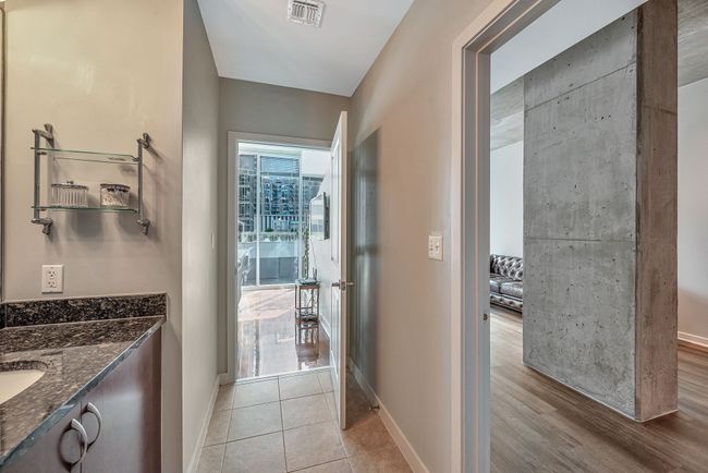 Full bathroom with access from living room and bedroom. Close your bedroom door and no one ever has to see you personal space! | Image 17