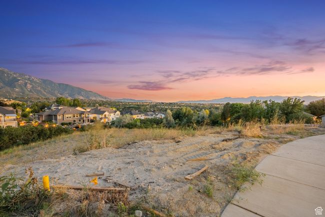 Mountain view with nearby suburban area | Image 25