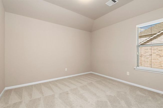 Bedroom #4 up with vaulted ceiling and walk in closet. | Image 32