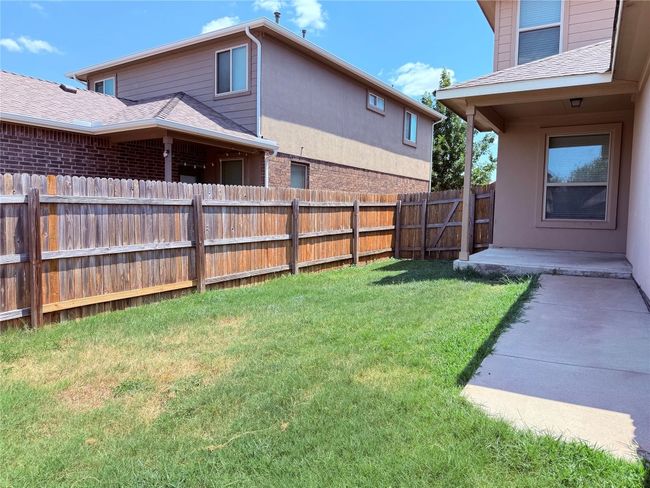 Fenced backyard featuring a patio area | Image 21