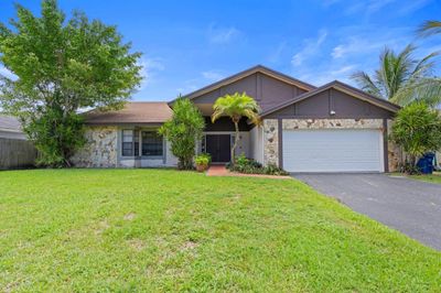 6900 Nw 47th Place, House other with 3 bedrooms, 2 bathrooms and null parking in Lauderhill FL | Image 1