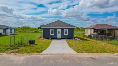 View of front of home featuring a front lawn | Image 1