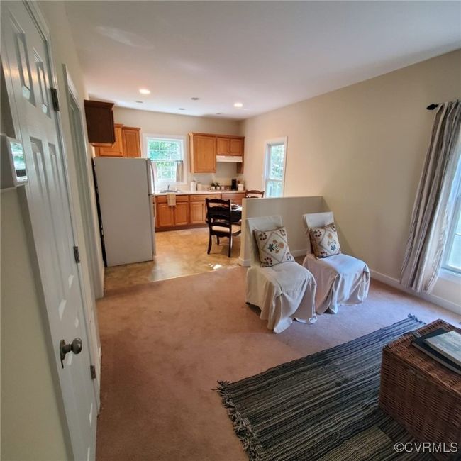 Living area featuring recessed lighting, baseboards, and light carpet | Image 23