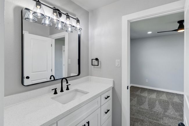 Bathroom featuring vanity and a ceiling fan | Image 33
