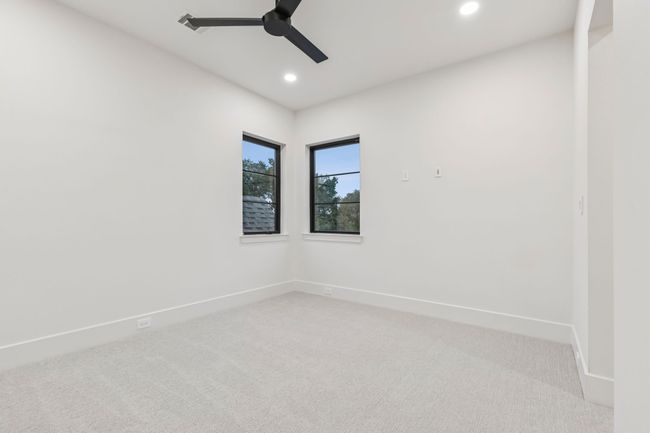 Unfurnished room with light carpet, ceiling fan, and recessed lighting | Image 18
