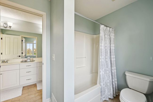 J&J bathroom has private shower and toilet room. | Image 50
