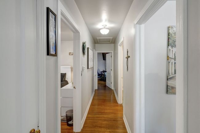 Hall with hardwood / wood-flooring | Image 13