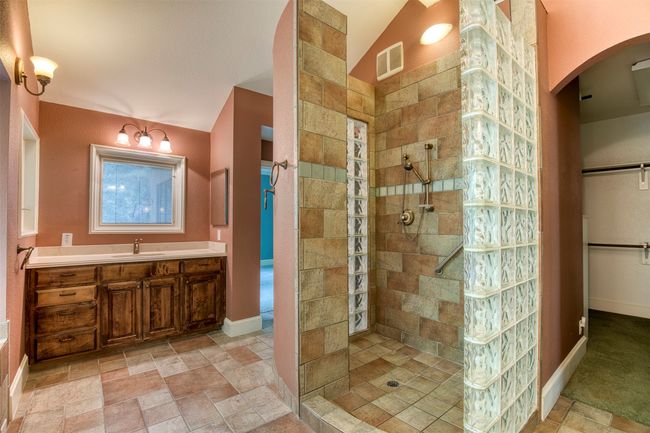 En-suite bath with luxury shower. | Image 19
