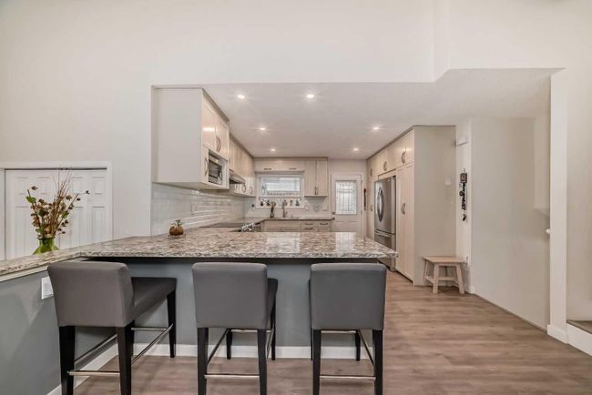 23 Sanderling Rise Nw, Home with 4 bedrooms, 3 bathrooms and 5 parking in Calgary AB | Image 6
