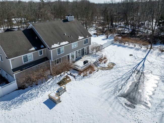 Aerial view back of house, deck and yard. | Image 29
