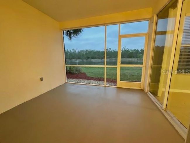Screened Lanai Overlooking Lake | Image 43