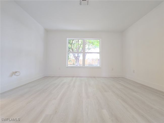 Unfurnished room with light wood-style flooring and baseboards | Image 29