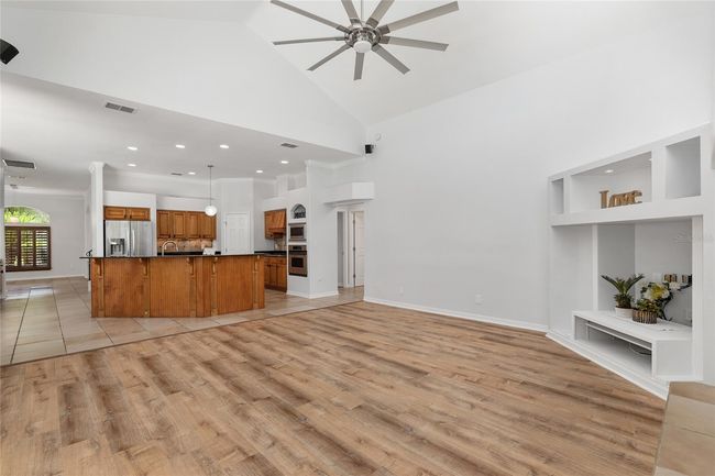 LOOKING BACK TO KITCHEN FROM FAMILY ROOM | Image 34