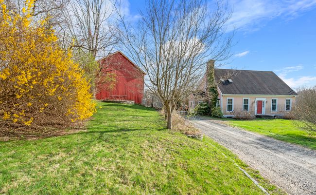 with the driveway and a barn for storge and aditional parking | Image 4