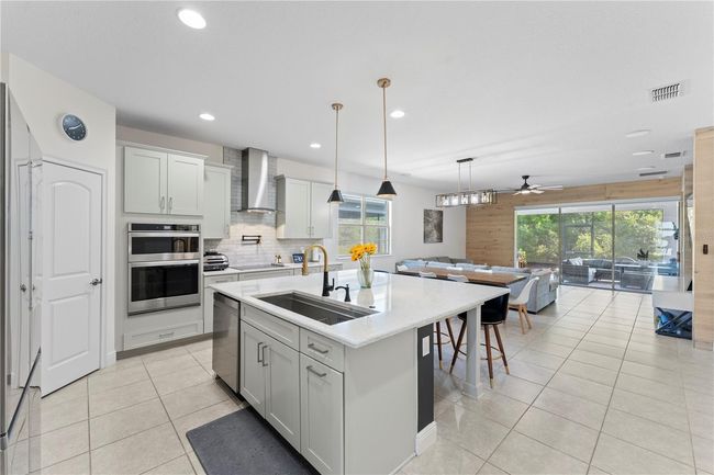 7465 Wing Span Way, House other with 4 bedrooms, 3 bathrooms and null parking in HARMONY FL | Image 18