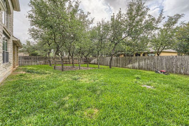 View of yard featuring a fenced backyard | Image 40
