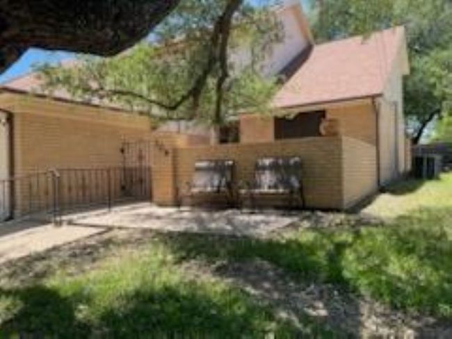 Back of property featuring fence and a patio | Image 8