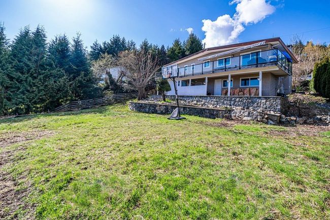 View of yard featuring fence | Image 38