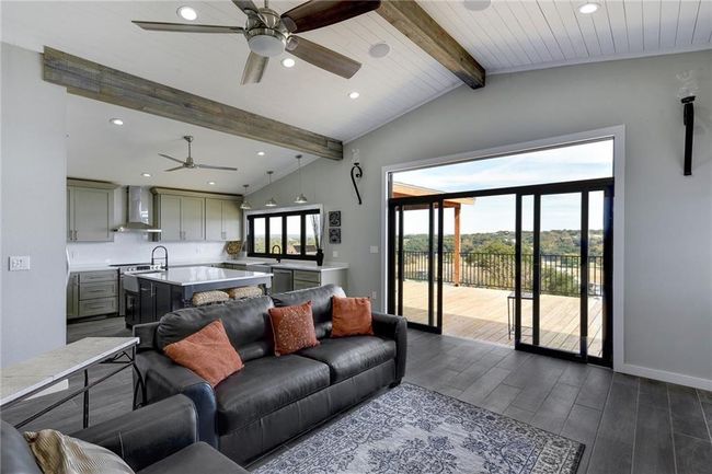Living room featuring ceiling fan, dark wood finished floors, recessed lighting, and baseboards | Image 7