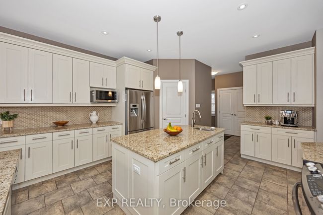 155 Wilbert Cox Dr, House other with 5 bedrooms, 4 bathrooms and 9 parking in Carp ON | Image 11