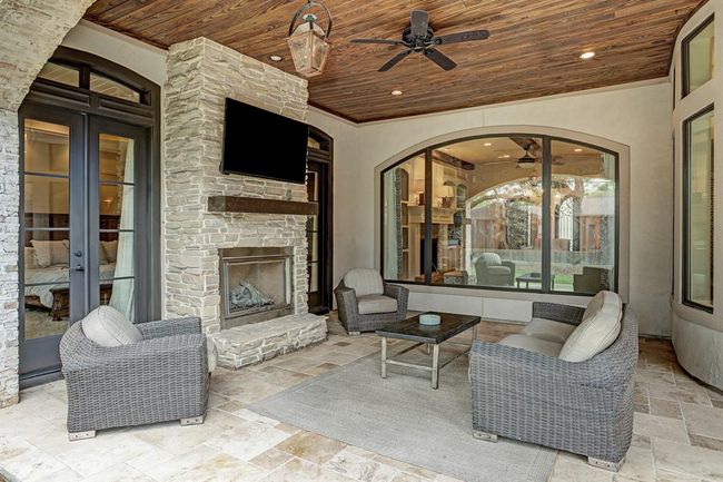 Complete with an outdoor fireplace! | Image 48