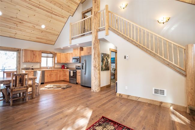 Looking towards kitchen & upper level | Image 74