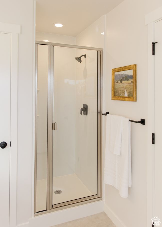 Bathroom featuring a shower stall and recessed lighting | Image 4