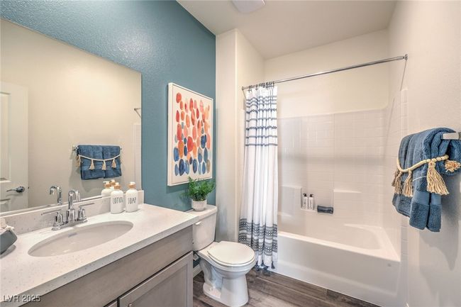Photo is representational only; actual home finishes may vary. Bathroom on the first floor | Image 19