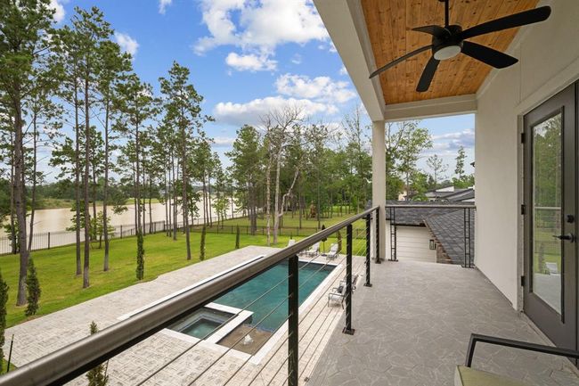 The bedroom boasts a stunning balcony with mesmerizing views, offering a perfect retreat to relax and unwind. | Image 33