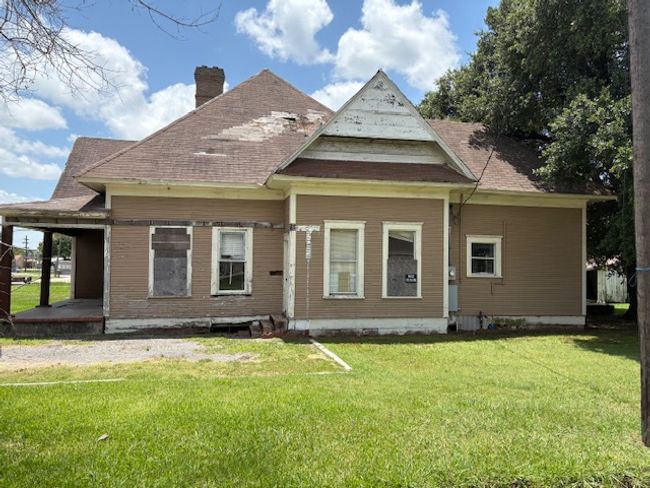 Back of property with a chimney and a yard | Image 5