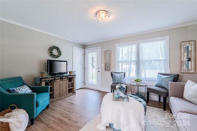 Updated paint and LVP make this cozy cottage seamless and charming! | Image 7