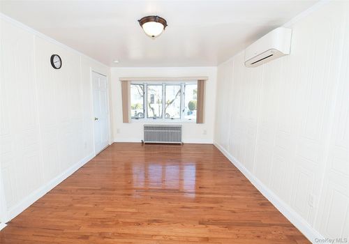 76 Hoffman Ave, Elmont, NY, 11003-2904 | Card Image