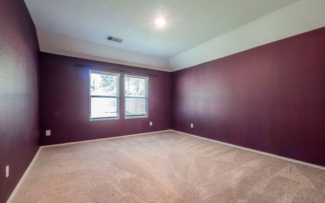 Carpeted spare room with baseboards | Image 8