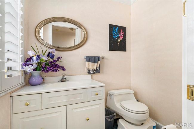 Bathroom with toilet and vanity | Image 9