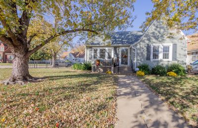 View of front of property featuring a front lawn | Image 1