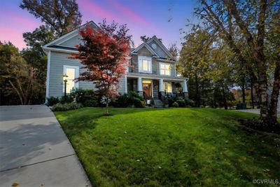 This exquisite craftsman style home is nestled on a quiet cul-de-sac with wooded privacy and seasonal views of the 14th green/fairway | Image 2