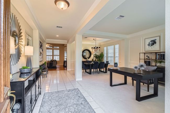 Welcome Home! Extended tile entry, high ceilings, 2 step crown molding, columns and rocker switches | Image 5