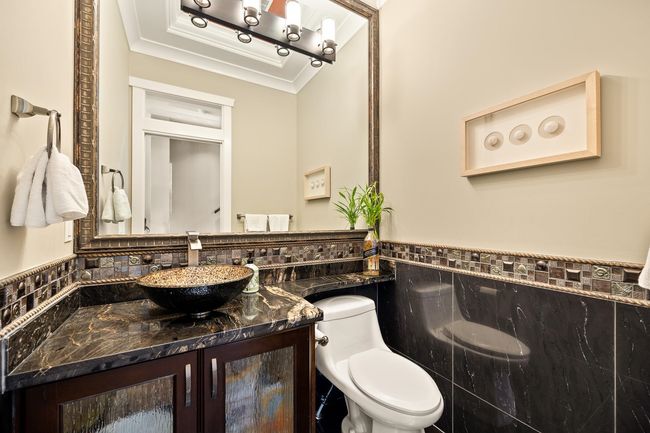 Bathroom with crown molding and vanity | Image 12