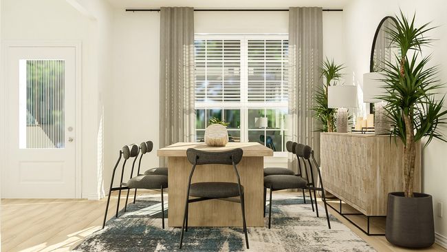 Dining area with wood finished floors | Image 15